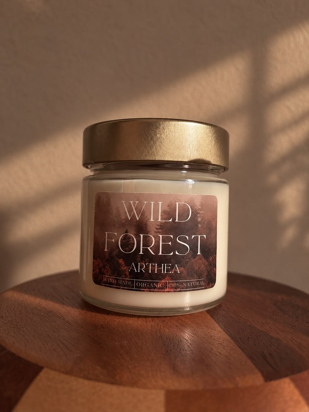 Vela aromática de cera de soja Wild Forest con mecha de
madera.