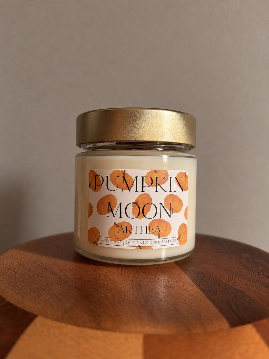 Vela aromática de cera de soja Pumpkin Moon con mecha de
madera.