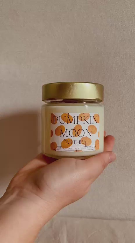Vela aromática de cera de soja Pumpkin Moon con mecha de
madera.